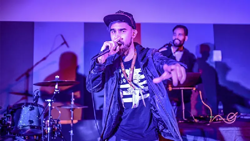 None Like Joshua — anime rapper and event MC performing at Knox Pop Con 2026