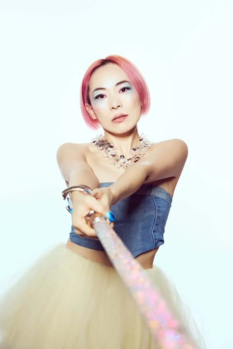 Shihori — portrait with signature pink hair and powerful pose
