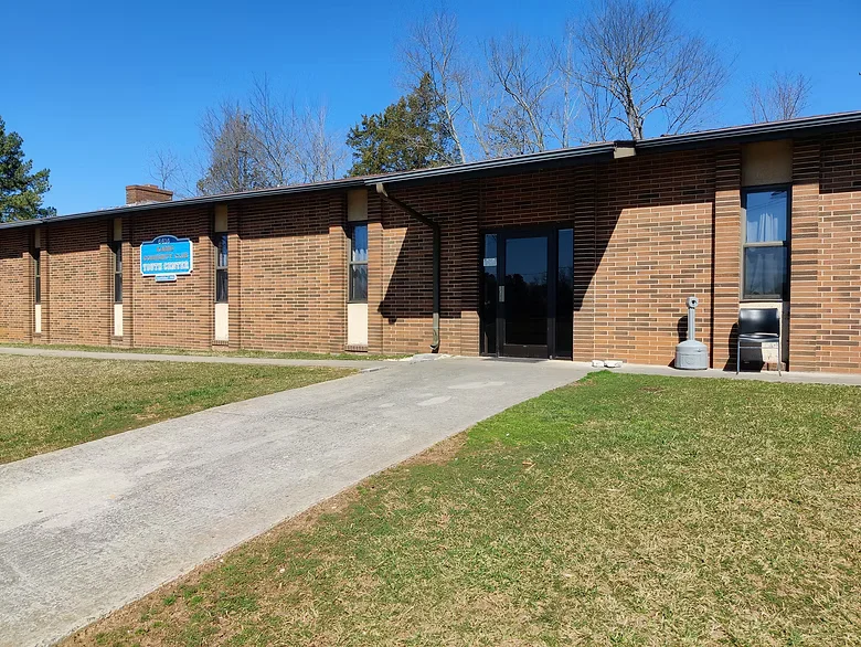 The Karns Community Club Event Center on Beaver Ridge Road: a single-story brick building with an entrance ramp.